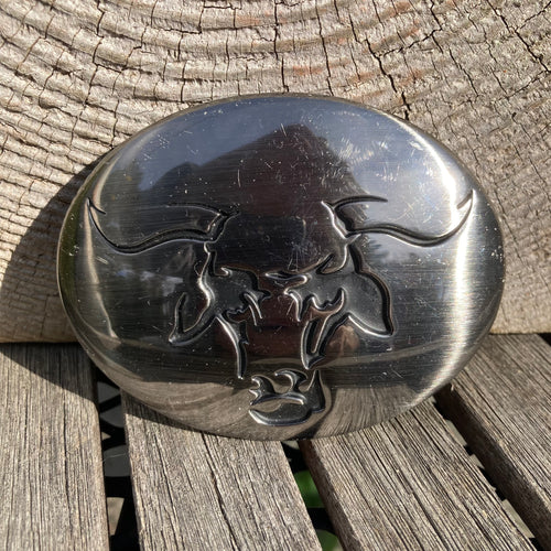 Oval-shaped belt buckle with Bull Head