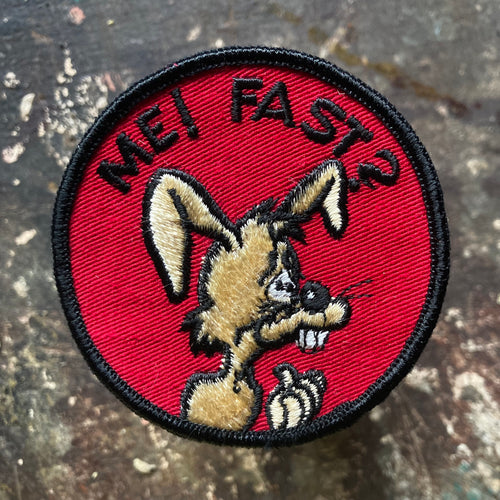 Vintage rabbit patch with the words ME! FAST? written on it. Suggestive retro design for sale on our vintage patch website.