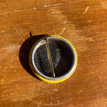 Vintage yellow Mr. Peanut button