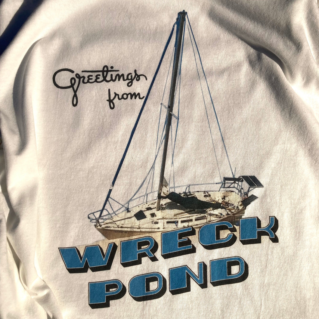 Greetings from Wreck Pond in Sea Girt, NJ. Home of then wrecked sailboat on North Beach that is currently abandoned. This is a funny spoof souvenir shirt for the beach town.