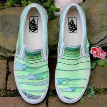 Green surfing swell lines custom designed Vans classic slip on sneakers