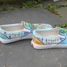 graffiti style writing custom designed Vans classic slip on sneakers