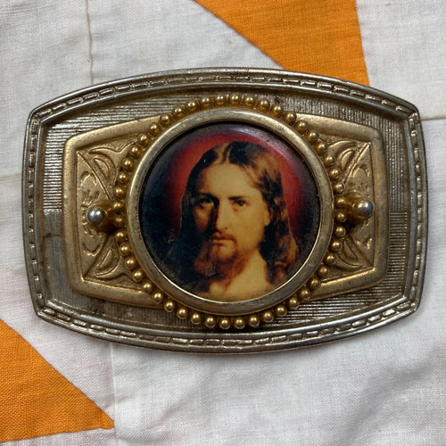Vintage Jesus Christ belt buckle for sale.