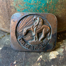 End of the Trail belt buckle