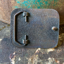 End of the Trail belt buckle