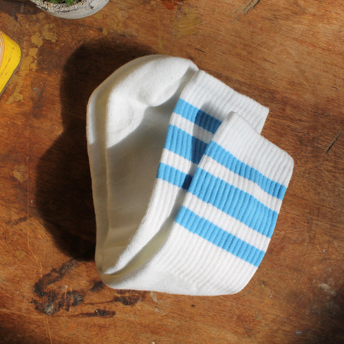 Light Blue tube socks for sale retro skateboarding style 1970s stripes