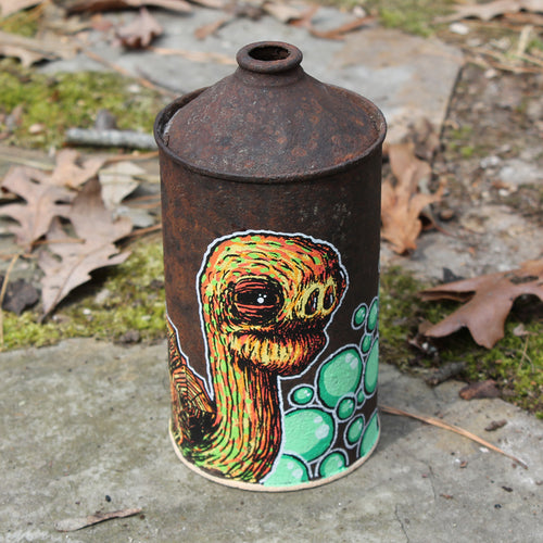 Original Tortoise artwork on an old oil can 