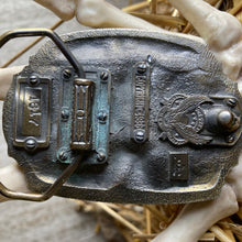 1986 Hunting enamel belt buckle